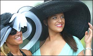 Tracy Hodgkin (left) and Rebecca Rolison enjoy Ladies' Day at Goodwood