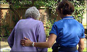 Elderly woman and nurse