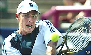 Marat Safin plays a backhand