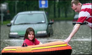 Seven year-old Jade gets pulled in a dinghy by her father David Crichton