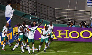 The Senegalese team celebrate after beating France at the World Cup