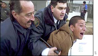 Man being arrested on Thursday