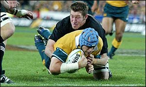 Australia's Nathan Sharpe scores the opening try against New Zealand