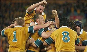 Australia players celebrate their dramatic win over New Zealand