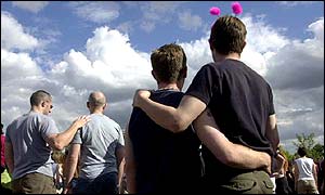 Homosexual men at the gay 2001 Mardi Gras, Hyde Park, London Saturday 30 June 2001.