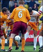 Rubio scores through a crowd of players
