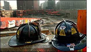 Firefighter hats overlook Ground Zero