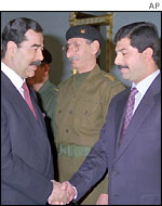 Saddam and Qusay Hussein