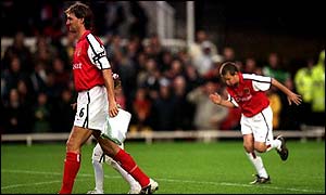 Tony Adams walks out with his children Amber and Oliver before his testimonial against Celtic