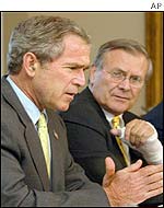 US President George W Bush (left) and US Secretary of Defence Donald Rumsfeld