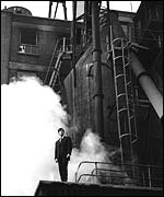 Terence Donovan's photograph of a model halfway up a gasometer