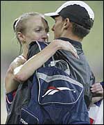 Paula Radcliffe hugs husband Gary Lough after winning gold in Munich
