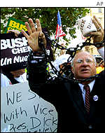 Protesters gathered outside the San Francisco hotel where Vice President Dick Cheney spoke, including impersonator Ed Holmes.