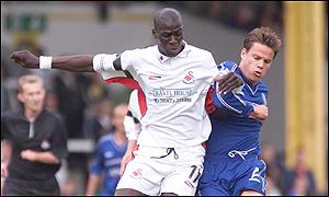 Mamady Sidibe (left) in action for Swansea