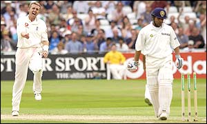 Dominic Cork celebrates as Sachin Tendulkar walks back to the pavillion after being bowled out leaving India on 108-3