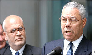 Chief Palestinian negotiator Saeb Erekat with Secretary of State Colin Powell