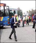 Coaches waiting to help passengers complete their journey