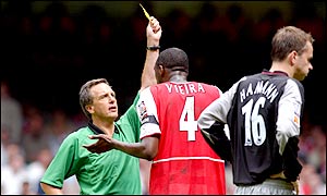 Patrick Vieira protests his innocence to referee Alan Wiley but to no avail