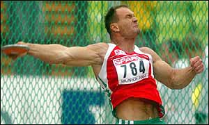 Hungary's Robert Fazekas throws for discus gold