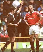 Roy Keane is booked by Andy D'Urso after his outburst