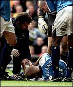 Alf Inge Haaland lays prone after Roy Keane's tackle on him in 2001