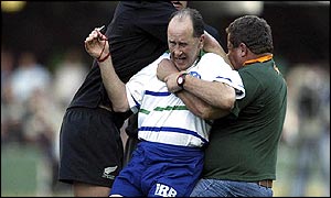 David McHugh is attacked by the South African fan