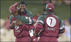 Mahendra Nagamootoo (centre) in action for the West Indies