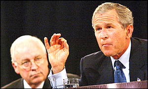 President George W Bush (right) with speaks as Vice-President Dick Cheney