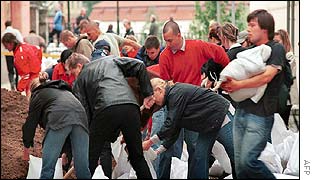 Volunteers outside the Alesovo Bank in Prague 