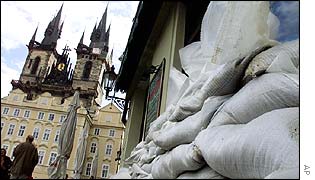 Sand bags stacked up against an old restaurant in the Old Town