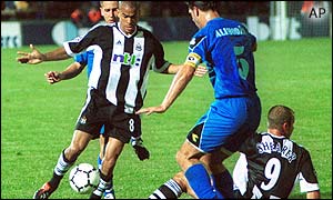 Newcastle midfielder dribbles through the Zeljeznicar defence
