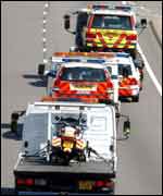 Police vehicles being removed