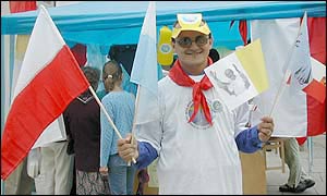 Street trader selling flags in Krakow