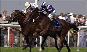 Golan (left) beats Nayef to take the King George VI And Queen Elizabeth Diamond Stakes