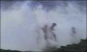 Children are engulfed on the Causeway rocks