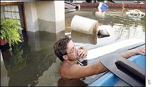 Man surveys damage to his home near Prague