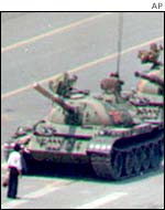 A protester blocks the way of tanks heading for Tiananmen Square in 1989