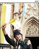 Girl waves Vatican flag