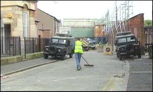 Workers clearing up after last week's of violence