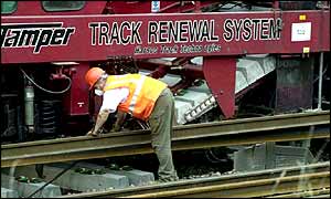 Worker laying new track