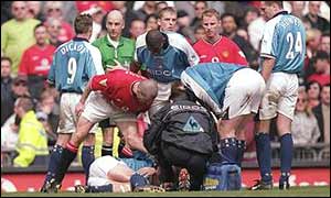 Roy Keane tells Alf Inge Haaland what he thinks after tackling him in the Manchester derby in 2001