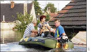 Residents in a small town near Prague assess the damage