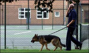 A police dog searches Soham Village College