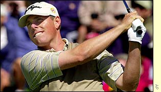 Justin Leonard tees off on the eighth at Hazeltine