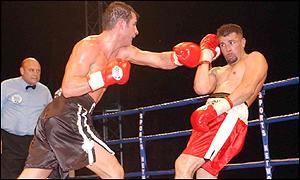 Joe Calzaghe (left) goes on the offensive against Miguel Jimenez