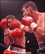 Miguel Jimenez takes a punch for Joe Calzaghe