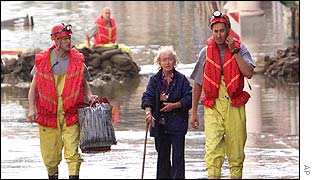 Resident being evacuated from Prague's Karlin district