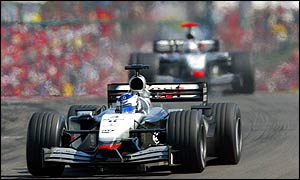 KImi Raikkonen leads David Coulthard during the Hungarian Grand Prix