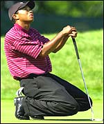 Tiger Woods took three putts at the 13th