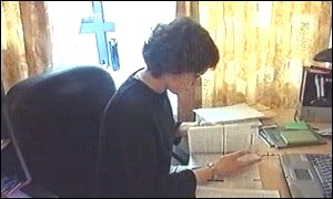 Anastasia Fedotova studying at her home